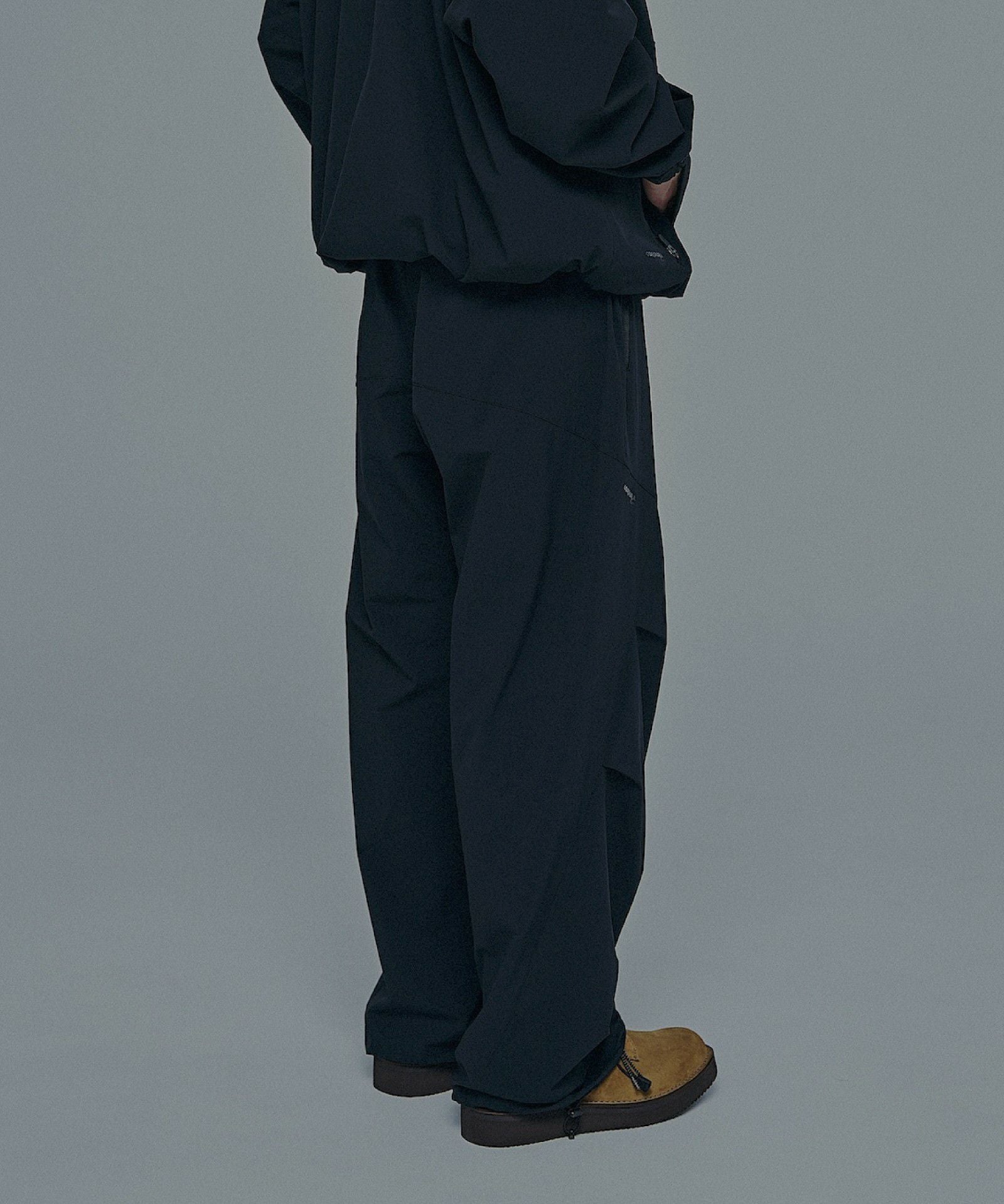 POLIQUANT×WILD THINGS PMC トラックパンツ│THE PMC TRACK PANTS
